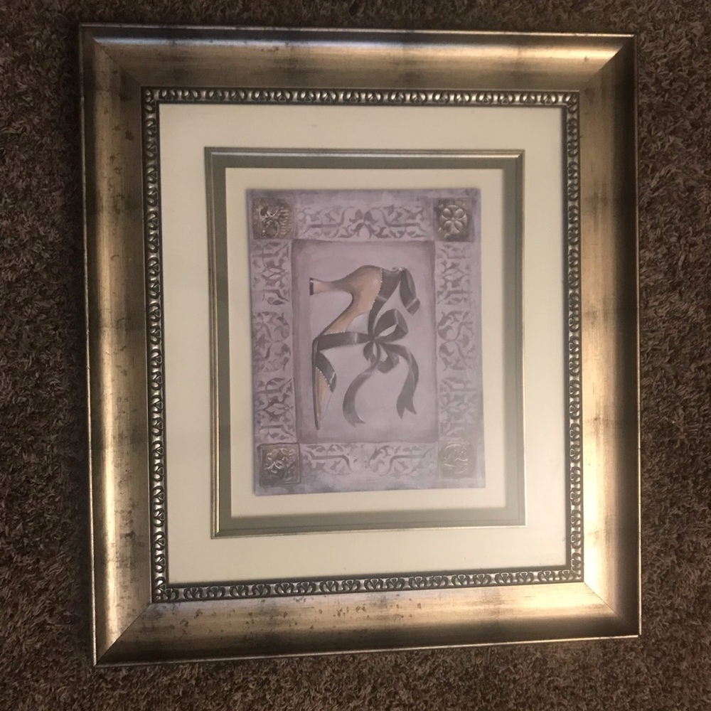 Gold frame with dress shoe wall decor